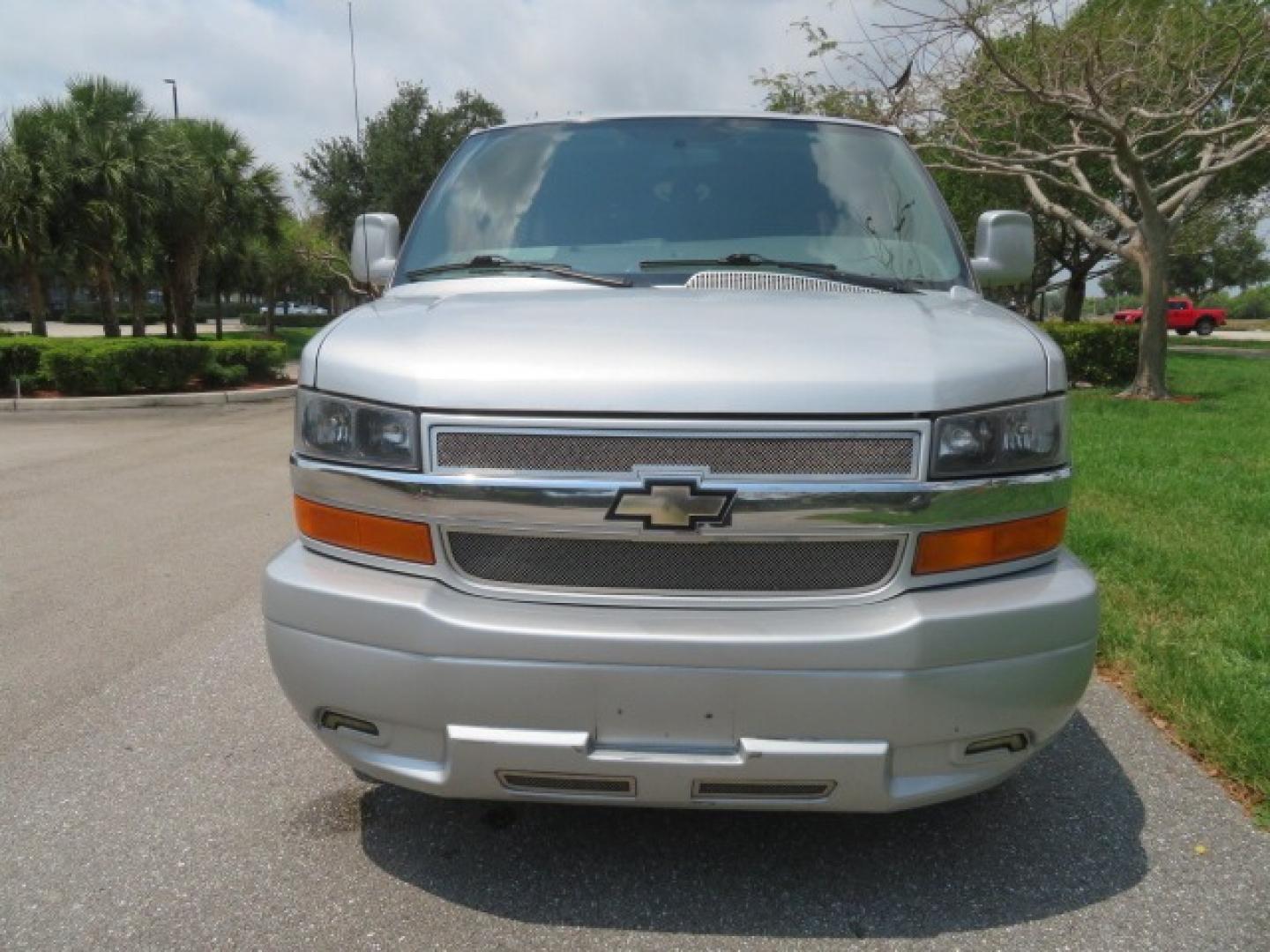 2014 Chevrolet Express (1GBWGLCG3E1) , located at 4301 Oak Circle #19, Boca Raton, FL, 33431, (954) 561-2499, 26.388861, -80.084038 - You are looking at a Rare 2014 Chevy Express 2500 Quigley 4x4 Four Wheel Drive Explorer Limited SE 9 Passenger Conversion Van with: 107K Original Miles, 6 Captain Chairs, Rear Power Folding Bench Seat Bed, Center Consoler Cooler, Front PPF (Paint Protection Film) Explorer Limited Conversion Througho - Photo#11